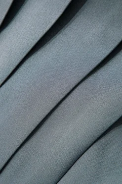 Buckle Layer Pleated Mini Skirt