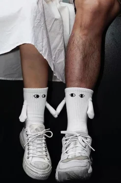 Hand Holding Socks