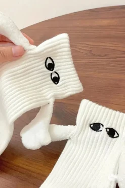 Hand Holding Socks